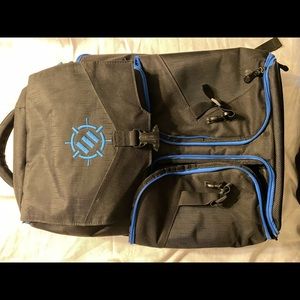 holds laptop, consoles, wires, games, headphones and remote controllers